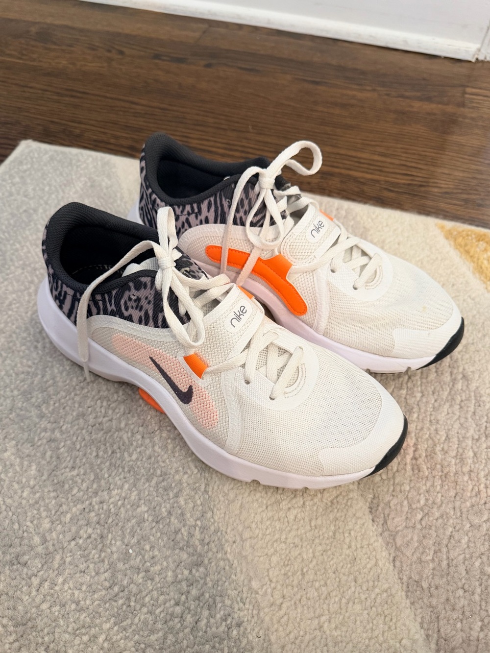 Nike White Sneakers with Orange and Leopard Print Accents